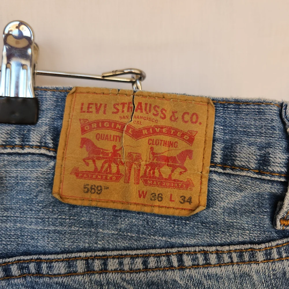 Levi's 569 Light Blue Loose Straight Men's Jeans |  Distressed | 36/34
